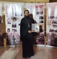 Хабаровский священник посетил презентацию фотоальбома «Последние залпы Второй мировой»